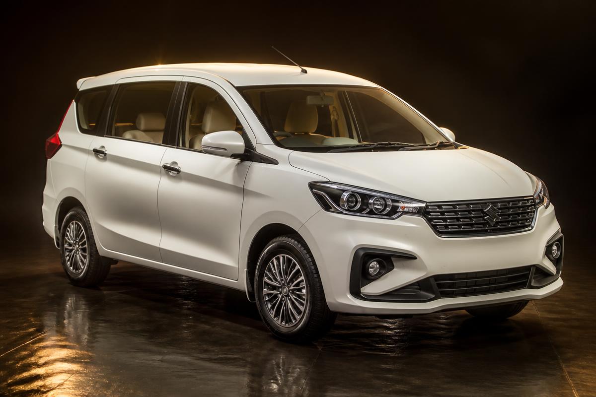Maruti Suzuki Ertiga in pearl white available for rent
